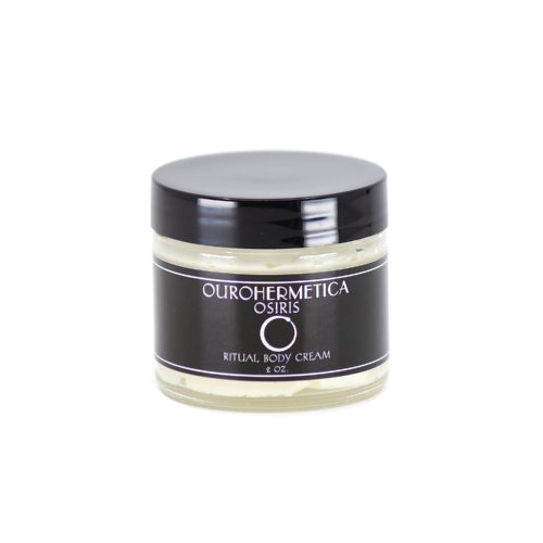 Jar of OuroHermetica Osiris skin cream in clear glass jar with black label with white ouroboros